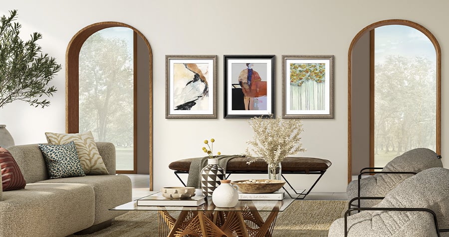 Living room with 3 framed art pieces hanging on the wall